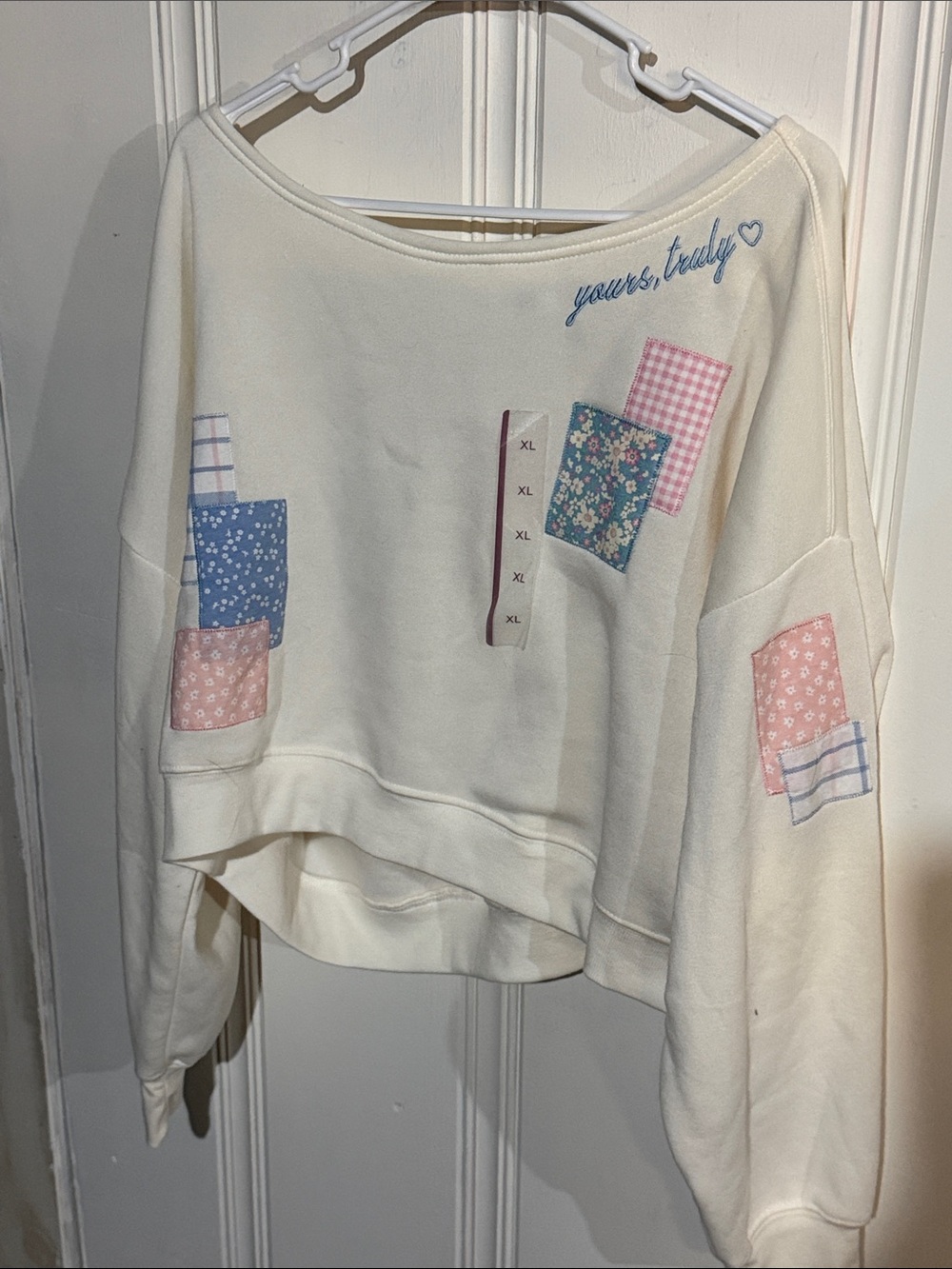 Mighty Fine Cream Off-Shoulder Patchwork Sweatshirt with Pink & Blue Accents